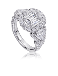Unique diamond and platinum engagement ring with triangular shaped side diamonds and pave setting